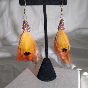 Swarovski and feather earrings